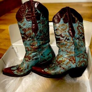 Turquoise and rich brown boots.